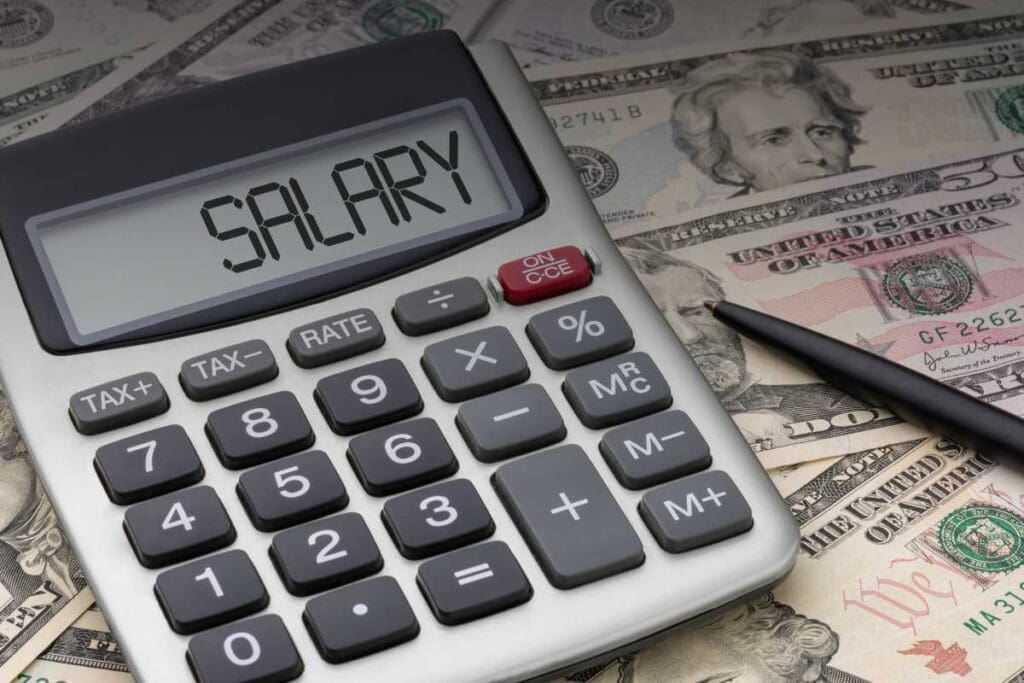 Quali sono le implicazioni economiche delle retribuzioni minime? Effetti su lavoratori, imprese e mercato del lavoro
